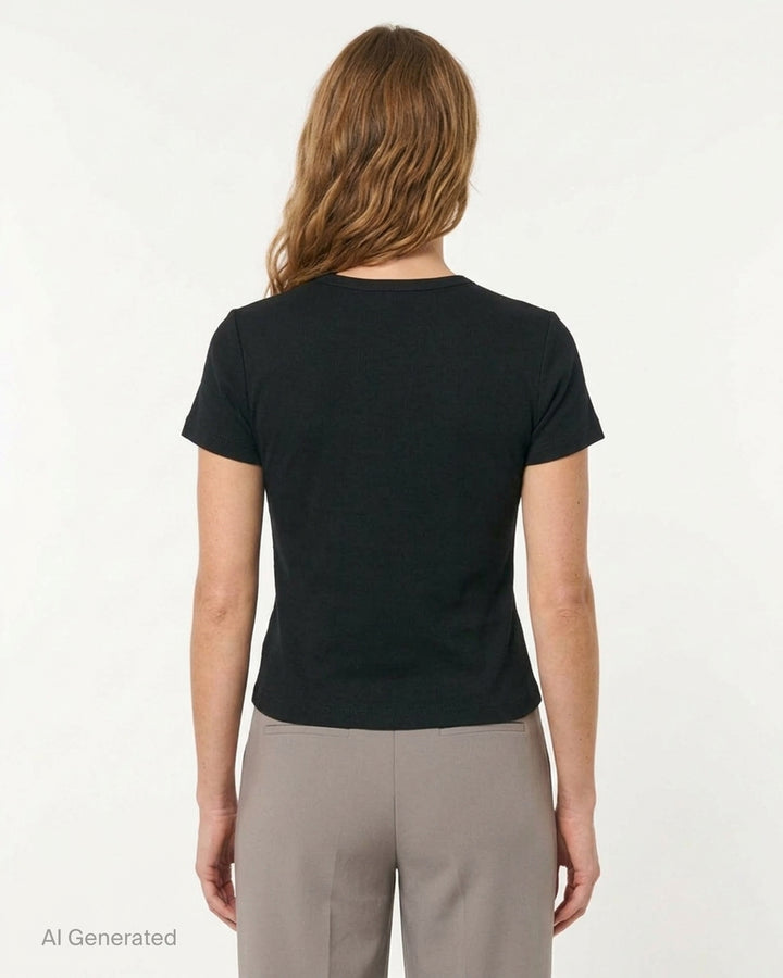 Glowny Classic Baby Tee in black — slim-fit cropped silhouette with a ribbed crew neck, short sleeves, and a woven Glowny label at the hem - back
