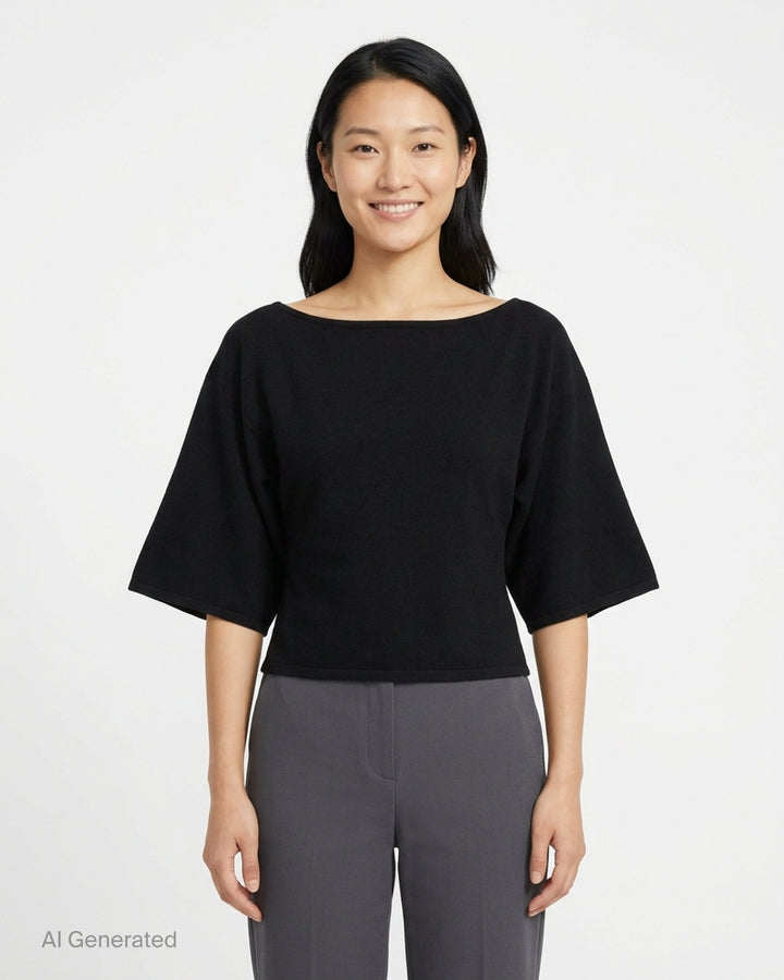 Glowny Melt Sleeve Blouse in black, featuring a wide bateau neckline and dramatic fluted three-quarter sleeves with a cropped silhouette - front