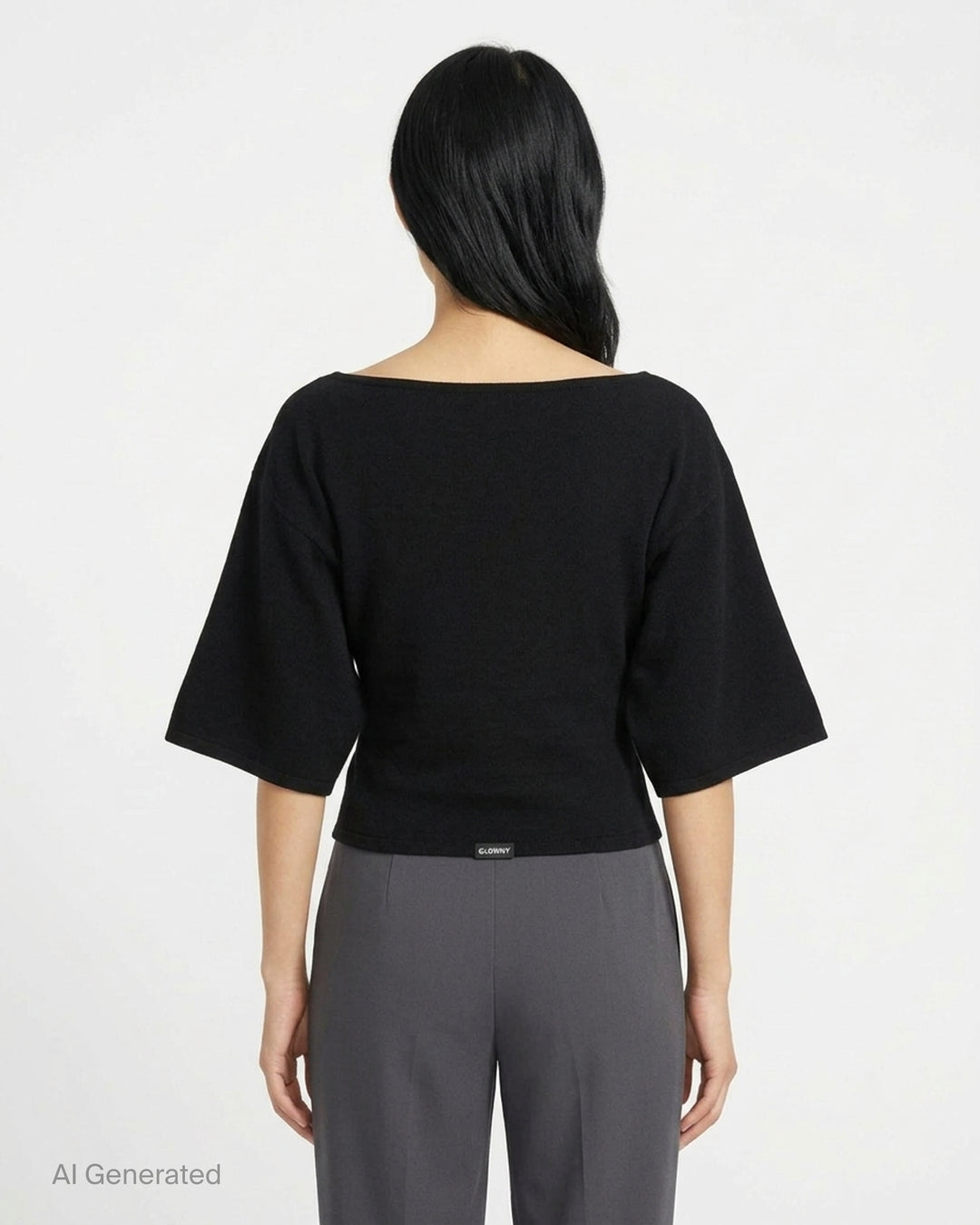 Glowny Melt Sleeve Blouse in black, featuring a wide bateau neckline and dramatic fluted three-quarter sleeves with a cropped silhouette - back