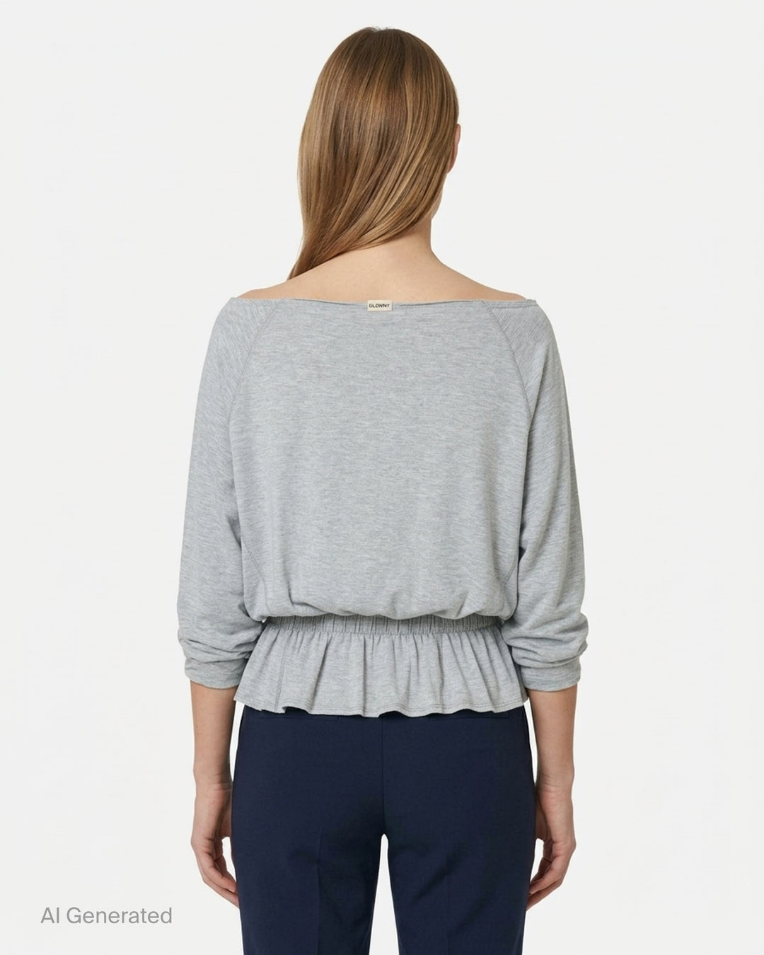 Glowny Sway Shirring Long Sleeve Blouse in heather grey, featuring a relaxed batwing silhouette, broad boat neckline, and an elasticated shirred frill hem - back