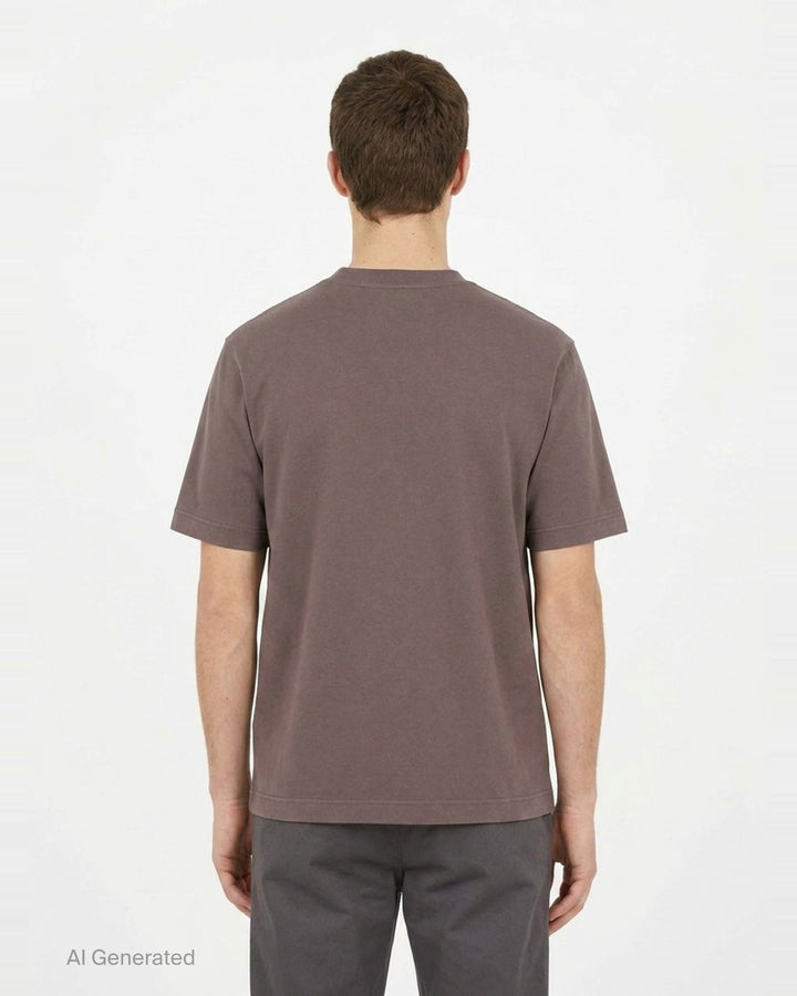 Jacquemus Le T-shirt Gros Grain in pale yellow, featuring a relaxed fit, crew neck, short sleeves, and a woven Jacquemus grosgrain logo tab on the chest - back