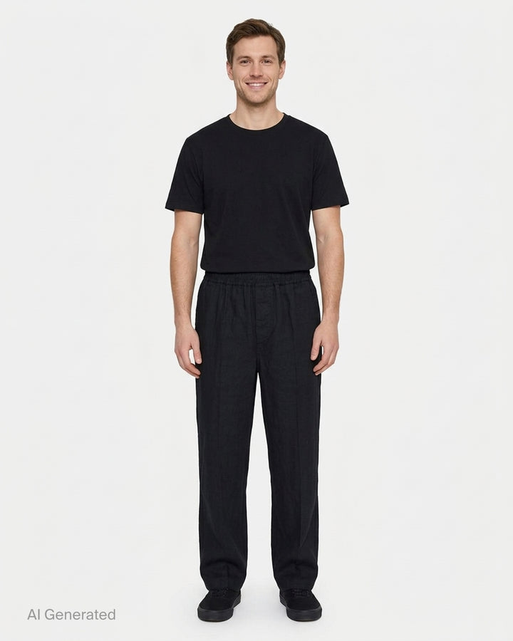 Jacquemus Le Pantalon Miami black wide-leg trousers with smocked elasticated waistband and pressed centre crease, front view - front