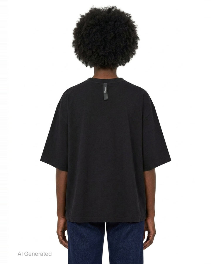 Jacquemus black oversized short-sleeve t-shirt with embroidered cursive logo across the chest and ribbed crew neckline, displayed on a white background - back