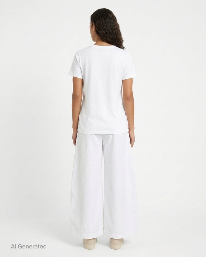 Jacquemus white wide-leg pleated trousers shown from the front against a plain white background - back