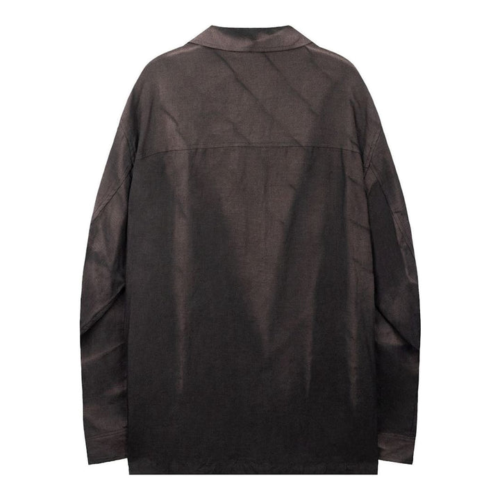 JiyongKim Sun-Bleached Strap Shirt in faded dark brown with open camp collar, chest pocket, button front and adjustable sleeve straps - packshot