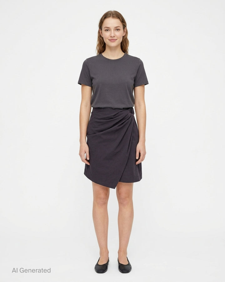 JW Anderson charcoal draped wrap skort with gathered hip detail and asymmetric overlapping hem - front