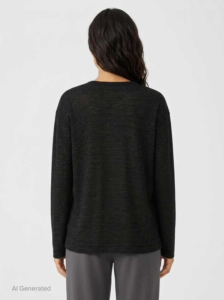 Lauren Manoogian Fine Low V-Neck Sweater in charcoal, featuring a deep V-neckline, oversized relaxed silhouette, dropped shoulders, and long sleeves, shown flat on a white background - back