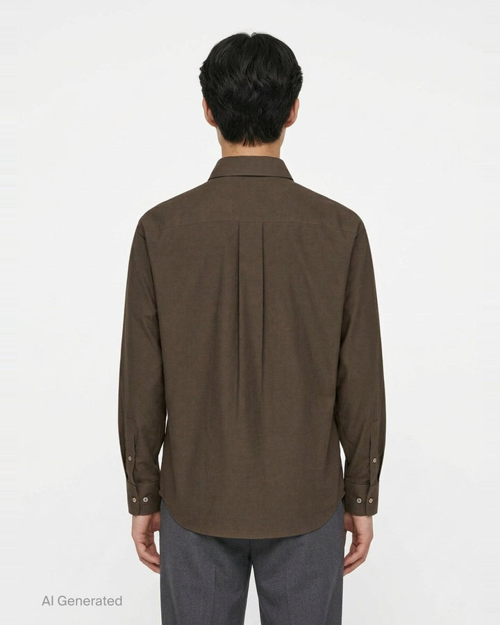 Lemaire Regular Long Sleeve Washed Cotton Shirt in slate grey, displayed flat against a white background, featuring a classic collar, white buttons, and a chest patch pocket - back