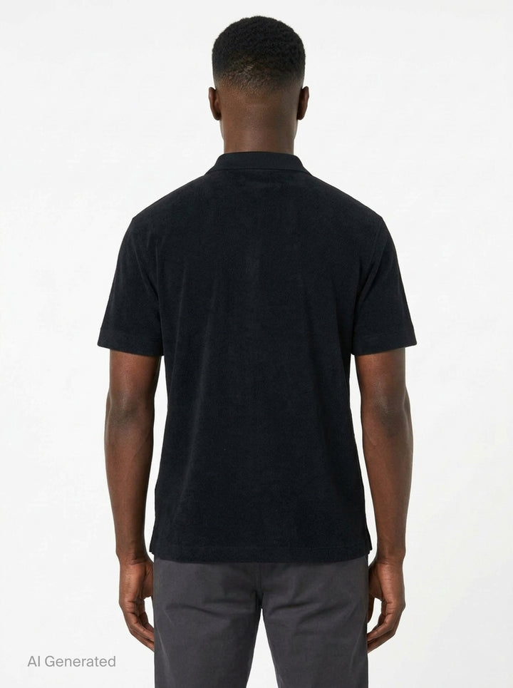 Maison Kitsuné black short sleeve comfort polo shirt with red embroidered running fox logo at the chest and three-button placket - back