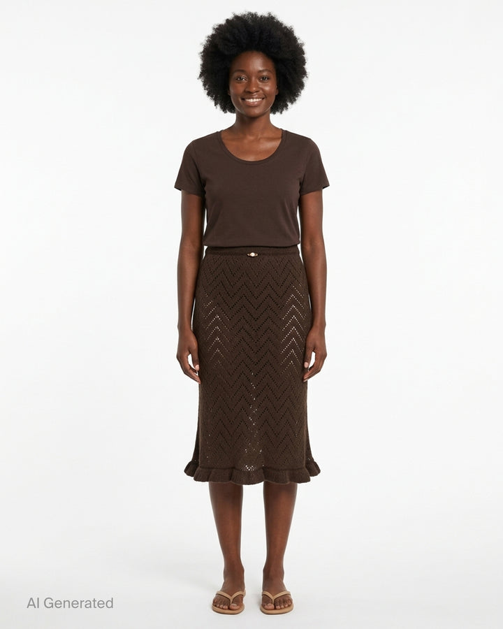 MSGM dark brown chevron pointelle knit midi skirt with ribbed waistband, pearl pin detail, and fluted ruffle hem trim, shown flat on white background - front