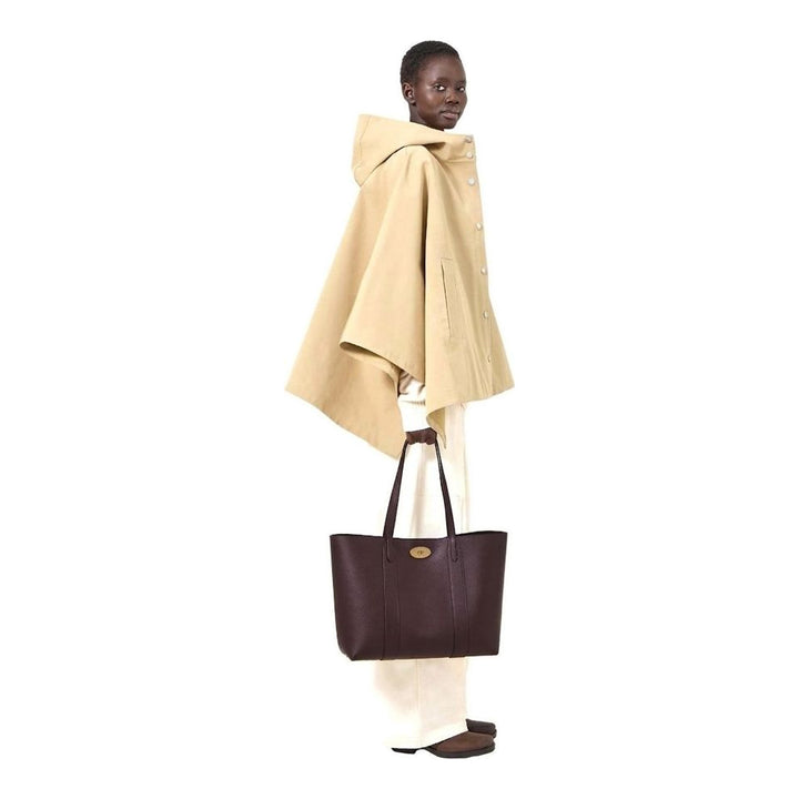 Mulberry Bayswater Small Tote in deep oxblood pebbled leather with twin flat shoulder straps and gold oval postman's lock hardware, front view on neutral background - packshot