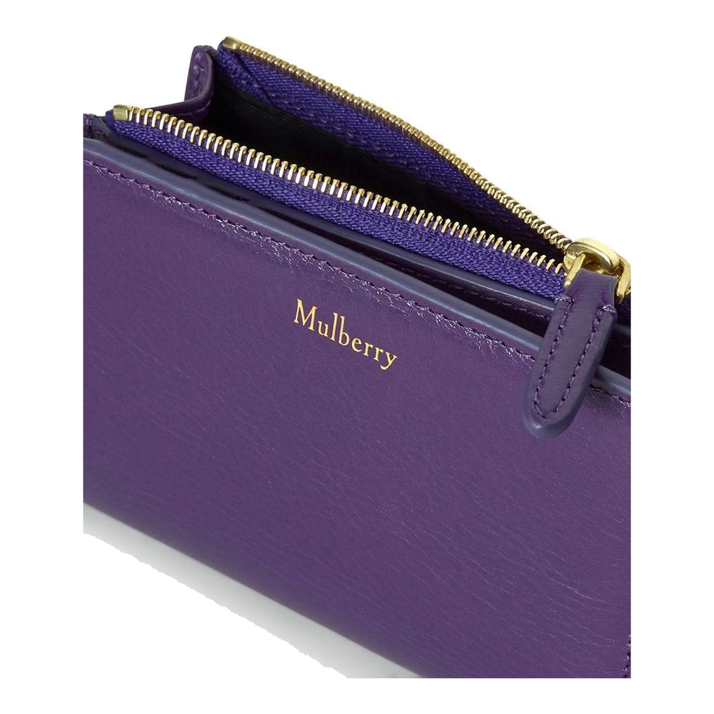 Mulberry Contin bifold zipped wallet in purple grained leather with gold-tone zip and gold foil logo, front view - packshot