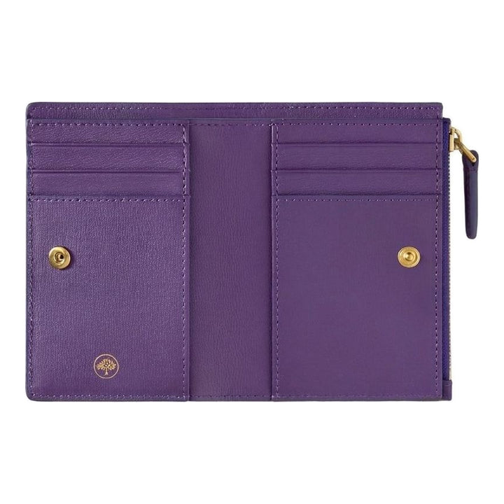 Mulberry Contin bifold zipped wallet in purple grained leather with gold-tone zip and gold foil logo, front view - packshot
