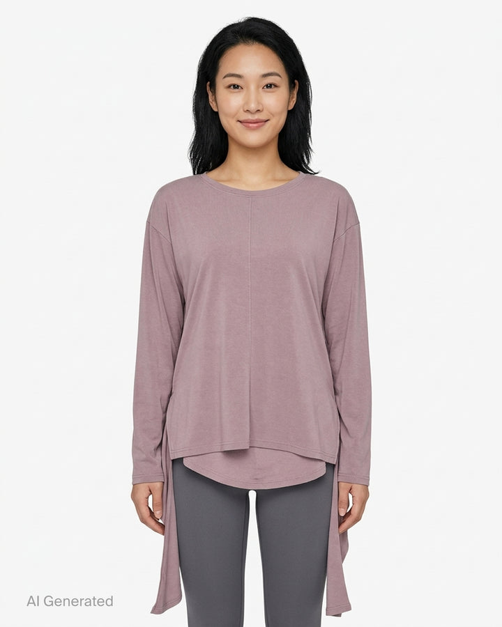 Nache Double Arm Long Sleeve Top in dusty mauve jersey with crew neckline, centre front seam and draped trailing side panels - front