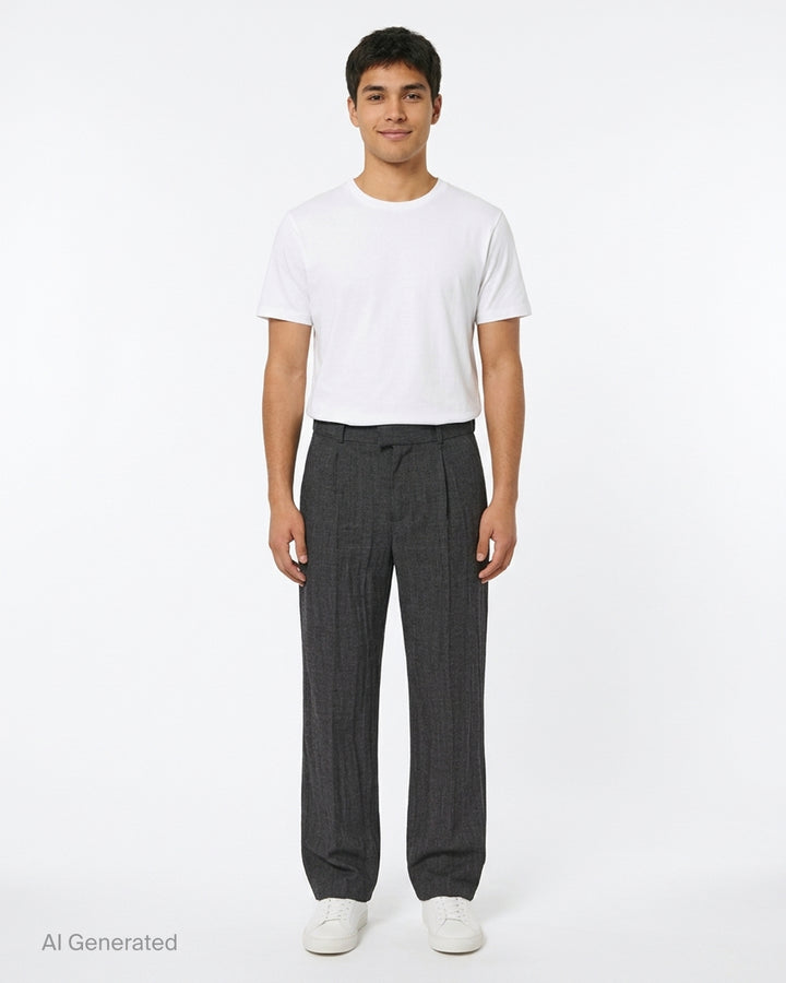 Our Legacy charcoal grey pleated slack trousers with a textured weave and straight-leg silhouette, shown from the front - front