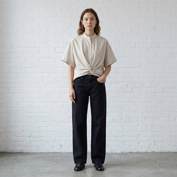 rag & bone Cam Full Straight Jeans in washed black denim, shown from the front with low-rise waist and full straight leg - lifestyle