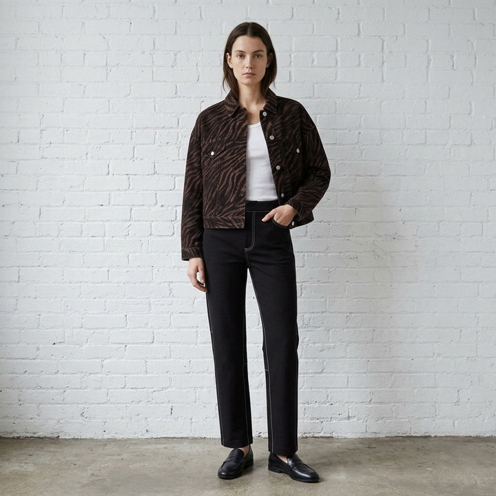 rag & bone Miramar Ponte Zebra Trucker Jacket in tonal brown and black zebra print with silver snap-button closures and dual chest pockets, front view on white background - lifestyle