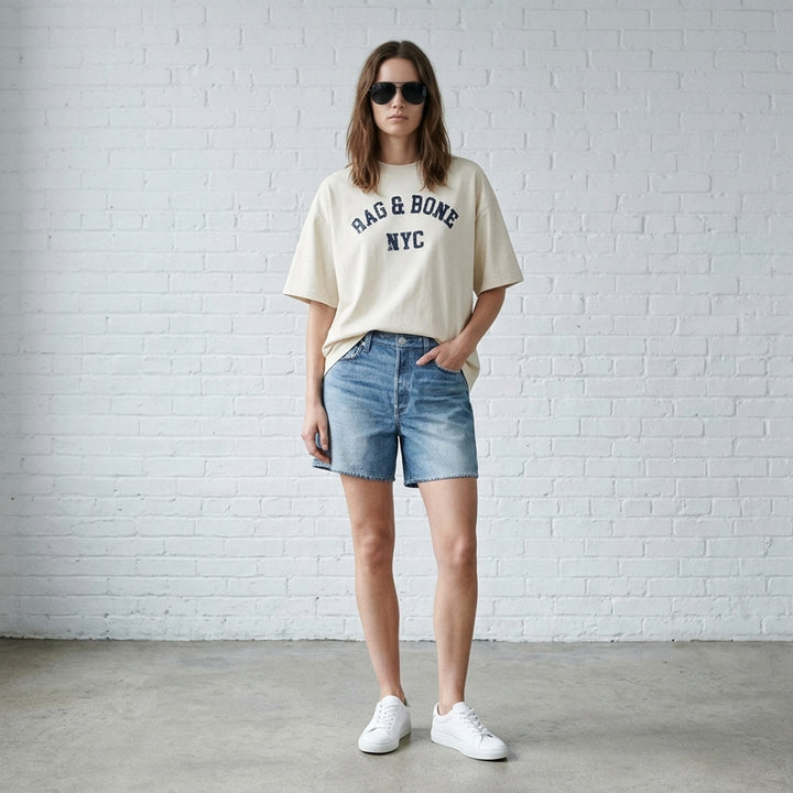 rag & bone University Alex Tee in washed navy, featuring a distressed arched collegiate graphic print reading 'RAG & BONE NYC', relaxed oversized fit with a crewneck collar and short sleeves - lifestyle