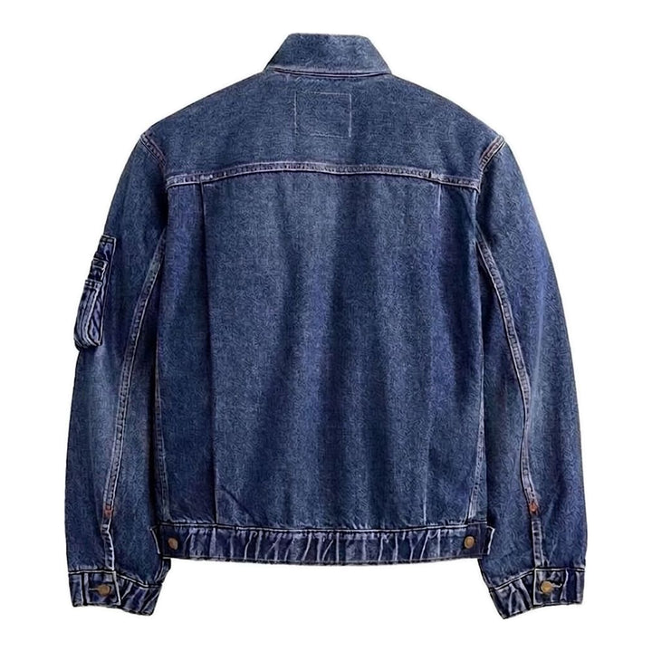 sacai x Levi's denim blouson jacket in stonewashed indigo with white zip front, flap chest pockets and sleeve zip pocket - packshot