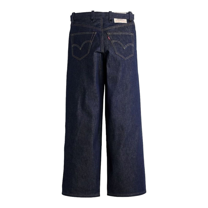 sacai x Levi's wide-leg mid-wash blue jeans with layered waistband and integrated webbing belt, shown flat from the front - packshot