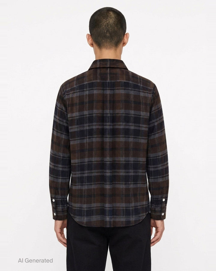 sacai plaid flannel long sleeve shirt in brown, navy, and grey check with deconstructed layered collar, dual chest pockets, and mother-of-pearl buttons, displayed flat on white background - back
