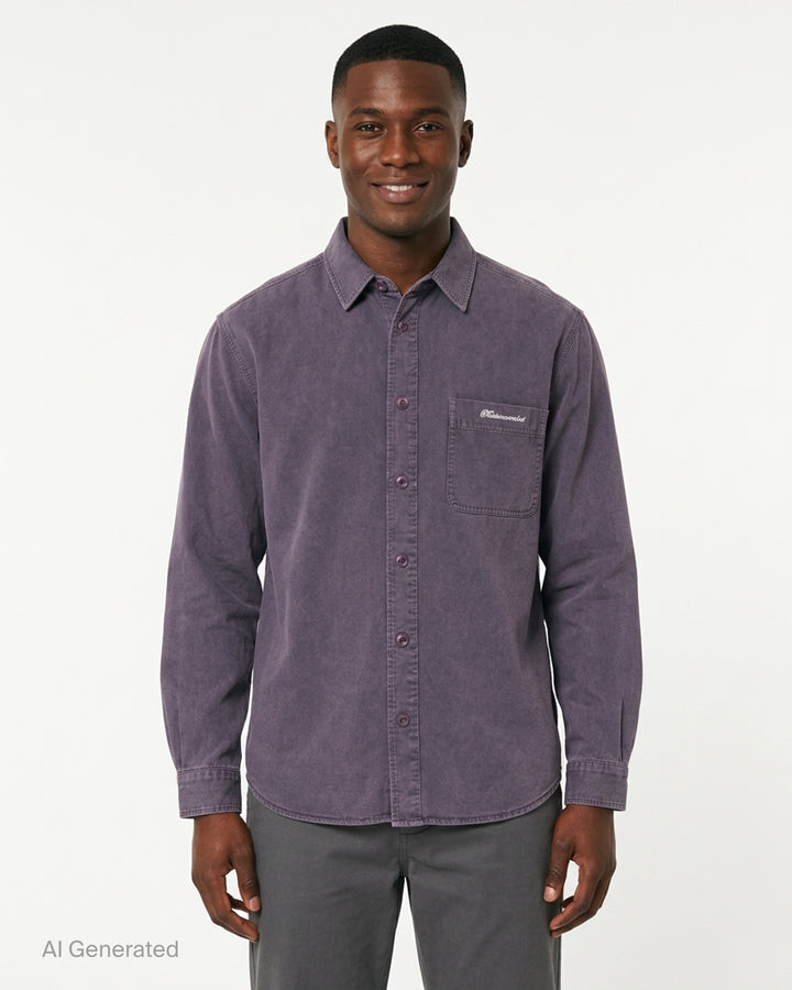 thisisneverthat Washed Twill Long Sleeve Shirt in faded charcoal, front view showing full button placket, chest patch pocket with embroidered script logo, and relaxed oversized silhouette - front