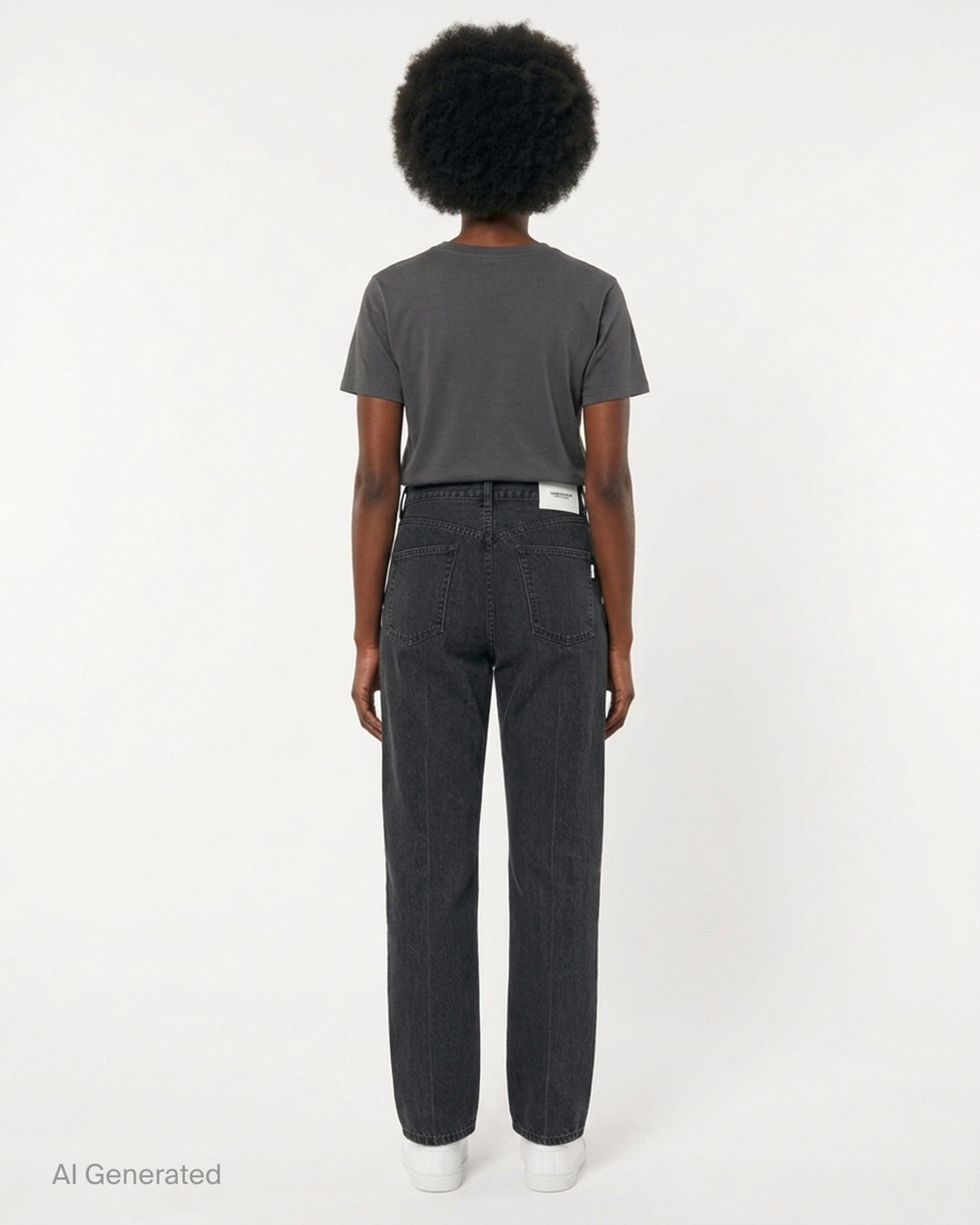 Undercover washed black straight-leg jeans with a white floral lace strip across the knee, shown from the front - back