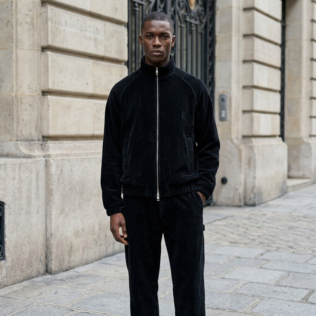 Wooyoungmi Flock Track Jacket in beige wide-wale corduroy with full-length silver zip, mock neck collar, raglan sleeves, and tonal logo patch - lifestyle