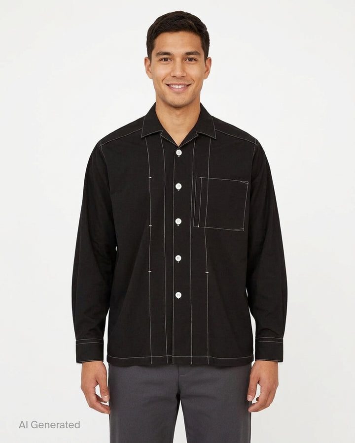 YOKE black long sleeve shirt with white contrast topstitching, camp collar, front button placket and patch chest pocket - front